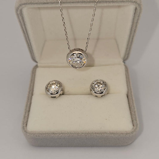 Beautiful Diamond Bezel Earrings and Necklace Set  in 18 Karat Gold plating over Sterling Silver  from Boujee Ice