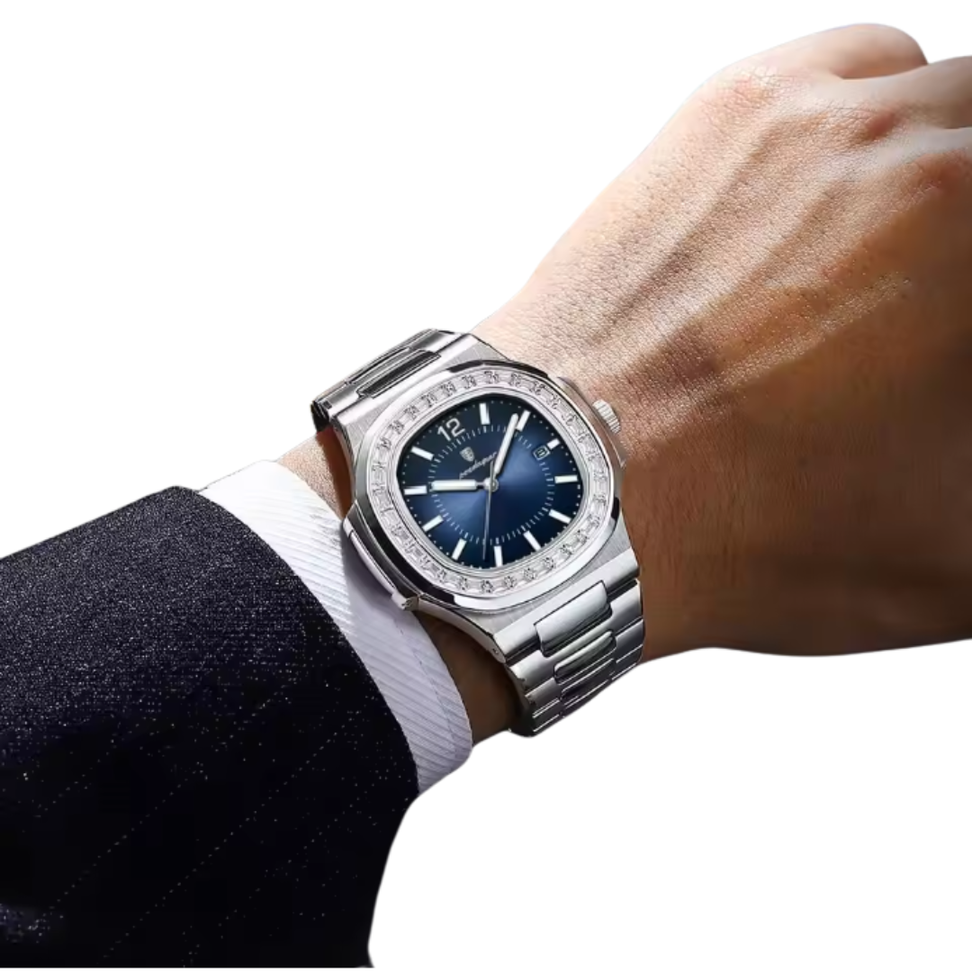 Luxury Boujee Ice watch with blue dial on a person's wrist against a white background